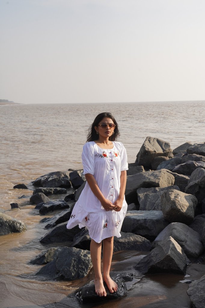 Boho Chic: White Embroidered Dress with Floral Detailing
